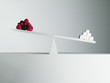 Sugar cubes tipping seesaw with berries on opposite end