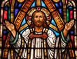 Stained Glass window of Jesus with his hands up
