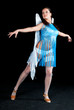 Woman in blue dress dancing