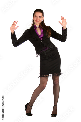Photo: Girl in black suit show hands. Girl in black suit show hands.