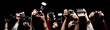 Raised hands holding different photocameras Raised hands holding different photocameras