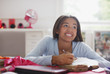 Teenage girl writing in journal