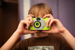 Photo: Boy with photo point-n-shoot film camera Boy with photo point-n-shoot film camera