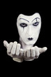 face and hands of mime with dark make-up face and hands of mime with dark make-up