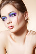 Foto: Beautiful model with bright fashion make-up, simple hairstyle Beautiful model with bright fashion make-up, simple hairstyle