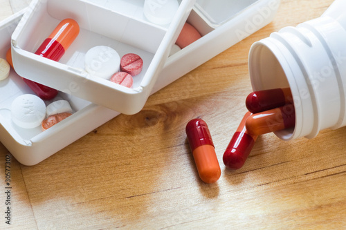 Photo: Tablets, capsules and pills sorted in pillbox Tablets, capsules and pills sorted in pillbox