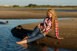 The red girl on a beach