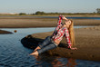 The red girl on a beach