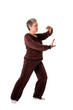 Photo: Senior woman doing Tai Chi Yoga exercise Senior woman doing Tai Chi Yoga exercise