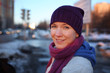 Happy young woman in winter city