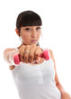 Young woman exercising using hand weights