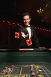 Man throwing dice at craps table