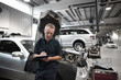 Mechanic working in auto repair shop