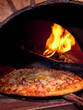 Pizza baking in the oven