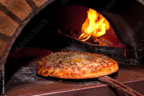 Photo: Pizza baking in the oven Pizza baking in the oven