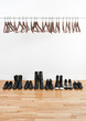 Row of shoes and empty hangers Row of shoes and empty hangers