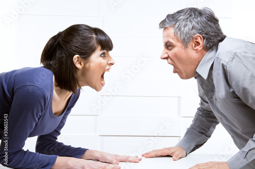 Photo: Couple yelling at each other Couple yelling at each other