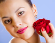 Studio portrait of sensual  woman with rose