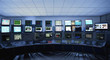 Computer screens in control room