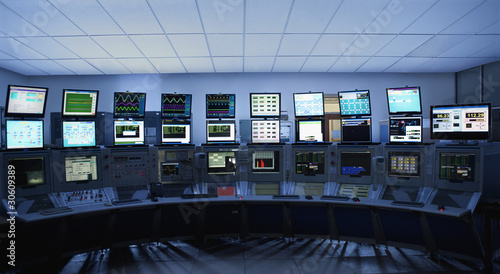 Photo: Computer screens in control room Computer screens in control room