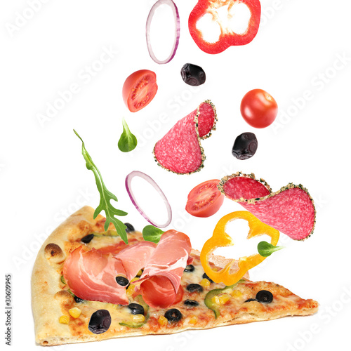 Photo: Pizza slice with ingredients in the air Pizza slice with ingredients in the air