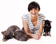Woman with her dogs chihuahua and English Stafford Woman with her dogs chihuahua and English Stafford