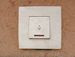 Doorbell on house wall, close-up