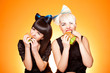two girls with burgers
