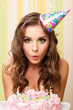 Photo: teen blowing candles teen blowing candles