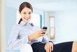 Young executive using cellphone