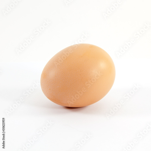 Photo: Single egg isolated on white Single egg isolated on white