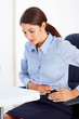 Female executive having stomachache