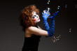 woman mime with soap bubbles.