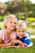 Boy with his sister in the park Boy with his sister in the park