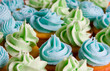 blue and green frosted cupcakes