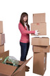 young girl packing up and moving - isolated young girl packing up and moving - isolated