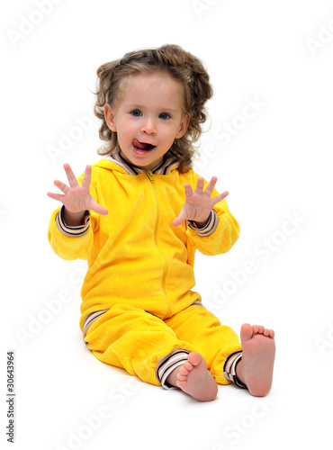 Photo: fun little girl in yellow sitting fun little girl in yellow sitting
