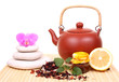 Teapot with flower isolated on white