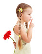 Child giving flower.
