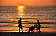 Family at the beach at sunset Family at the beach at sunset