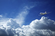 Private jet aircraft in a blue sky