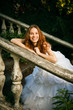 Bride posing on old stairs