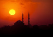 Photo en ligne au meilleur prix The sun sets behind a silhouetted mosque in Istanbul, Turkey