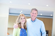 Man embracing adult daughter