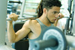 Photo: Man lifting barbell Man lifting barbell