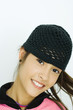Teen girl wearing knit hat, portrait