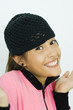 Teen girl, holding up hands, smiling at camera, portrait