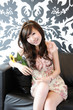 Beautiful Asian Chinese model holding sun flower