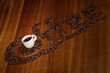Schriftzug mit Tasse