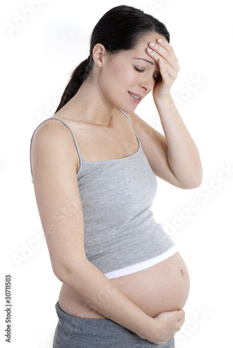 Photo: Pregnant woman with headache Pregnant woman with headache